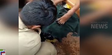 Firefighters rescued a crippled student who fell into a tar barrel while playing