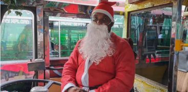 santa claus driving the bus; Merry Christmas to passengers