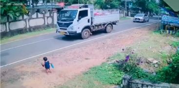 CHILD ON ROAD VISUAL FROM KOPPAM