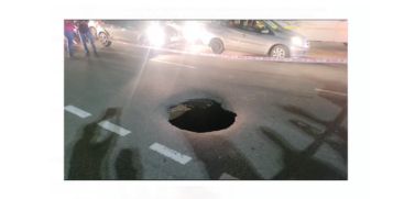 A huge pothole has formed on the Kazhakoottam National Highway Bypass