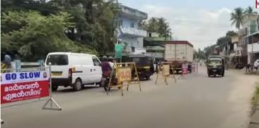 Dividers have been installed on Iringalakuda Karuvannur Cheripalam road