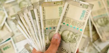 Rupee falls to record low