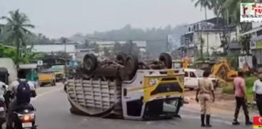 Mini pick-up overturned