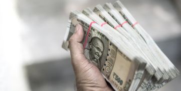 Rupee Gains 4 Paise Against the Dollar