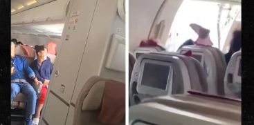 Passenger arrested for opening plane emergency  door