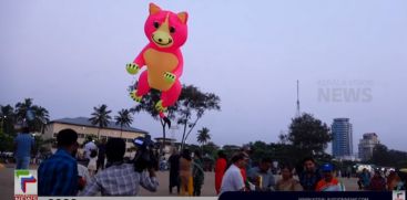 Kite flying is a curiosity for those who came to enjoy the evening beauty of Kozhikode beach