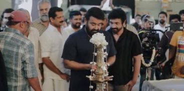 Mohanlal lights the lamp,